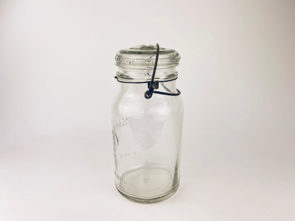 Product image for 'antique safety seal wide mouth glass jar 2 pint capacity metal hinge clasp aka lightning jar made in canada farmhouse decor' (view 31eb79)