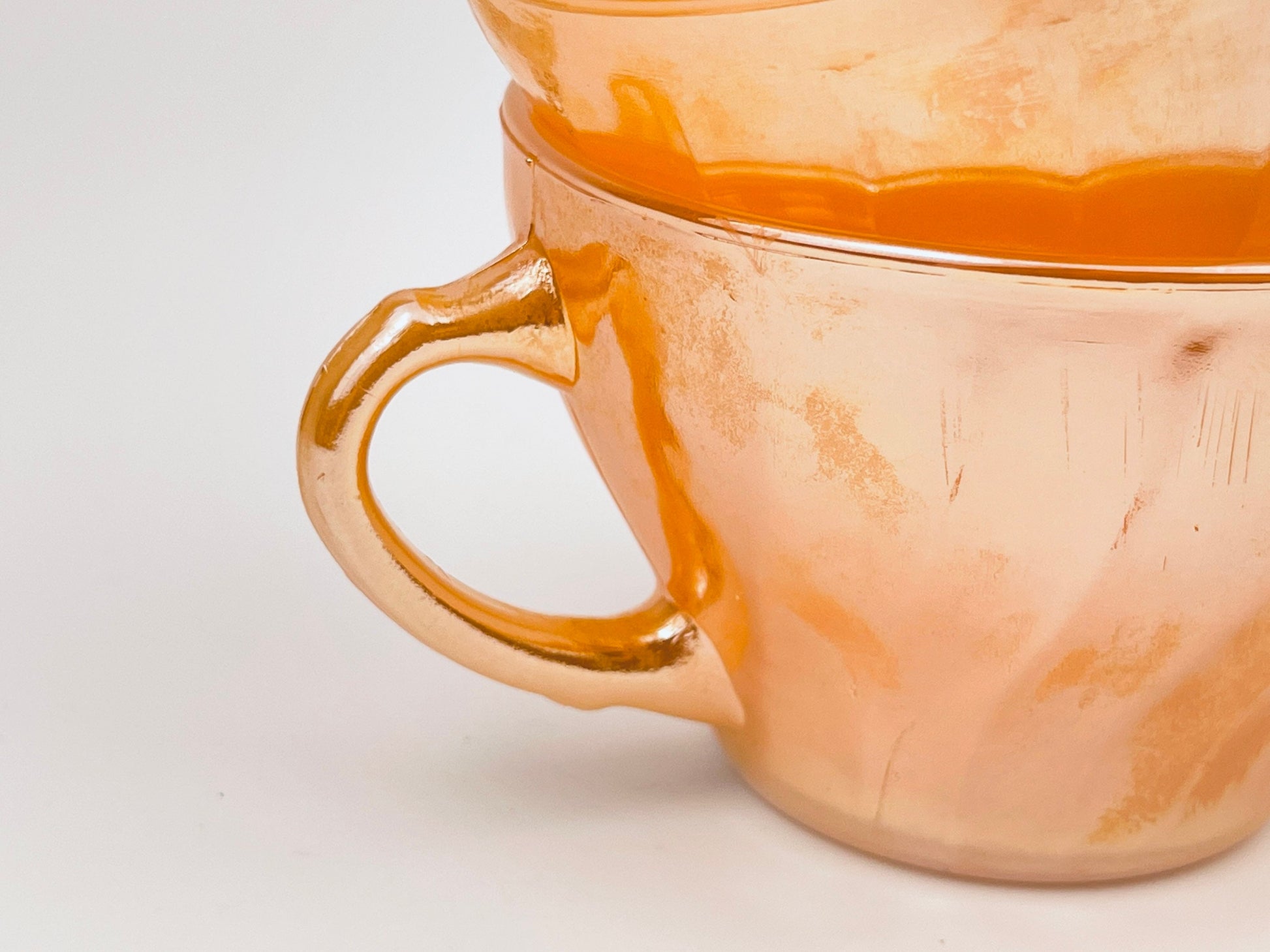 Product image for 'vintage peach lustreware swirl tea cups set of two 2 anchor hocking fire king made in usa' (view f3a3ec)