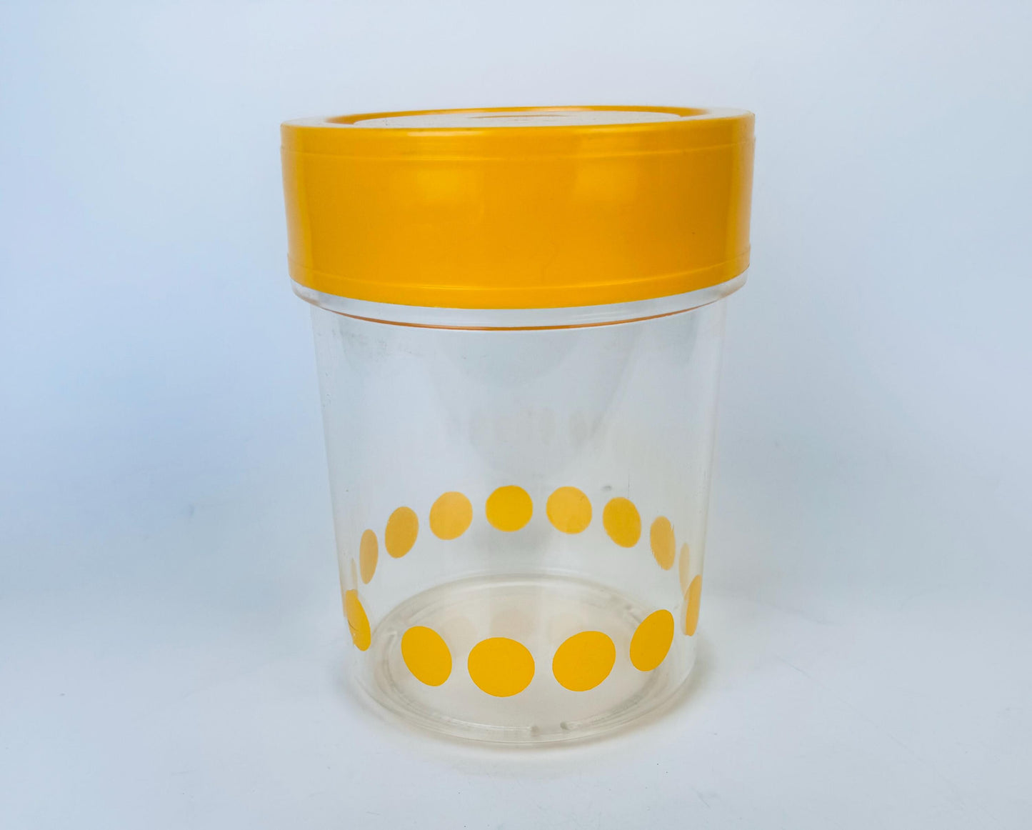 Product image for 'vintage mcm danish yellow polka dot plastic countertop canister made in denmark by garant plast' (view 8b9486)