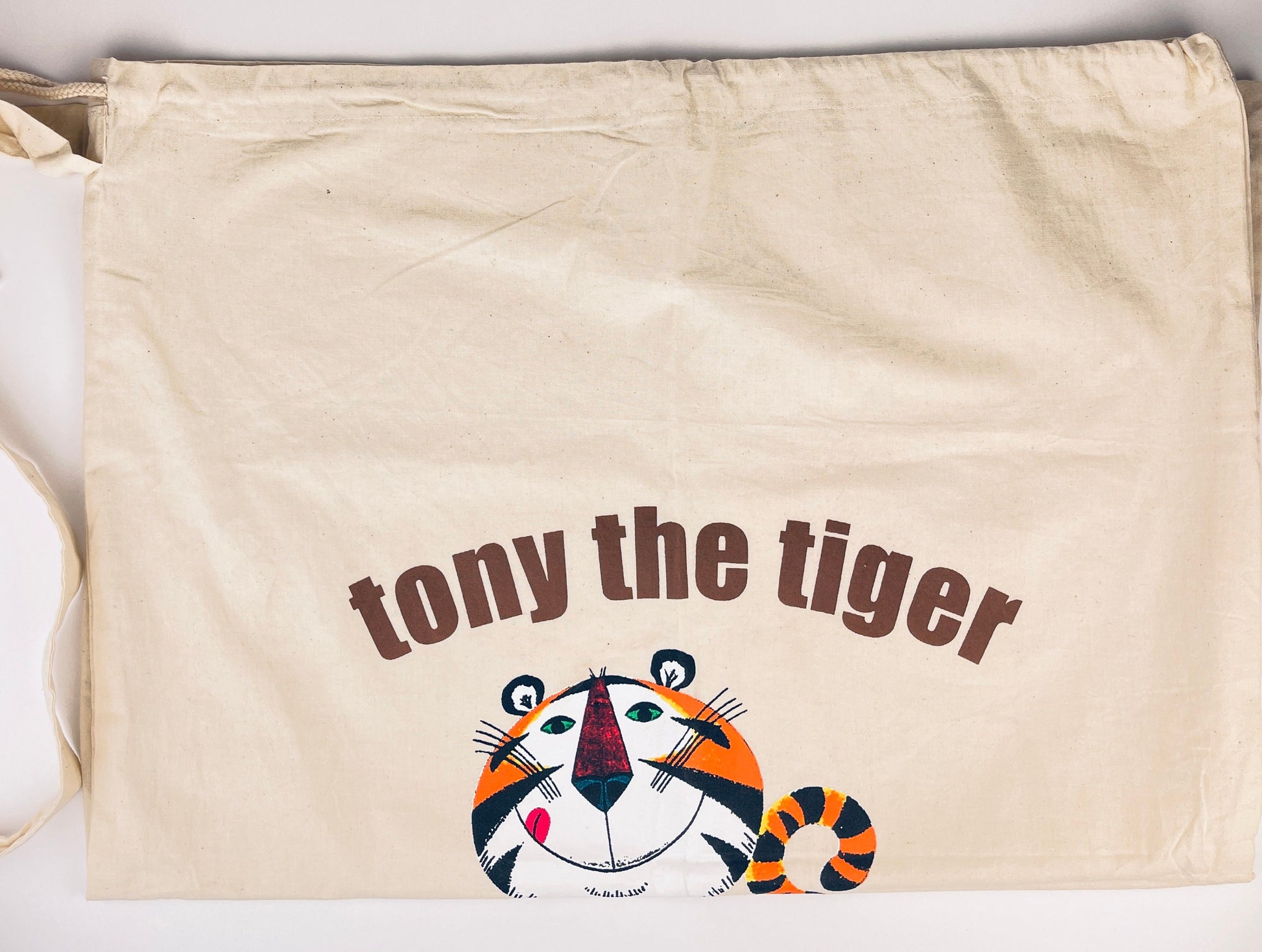 Product image for 'vintage tiger cartoon character linen blend laundry bag shoulder strap cinch closure' (view b22e4c)