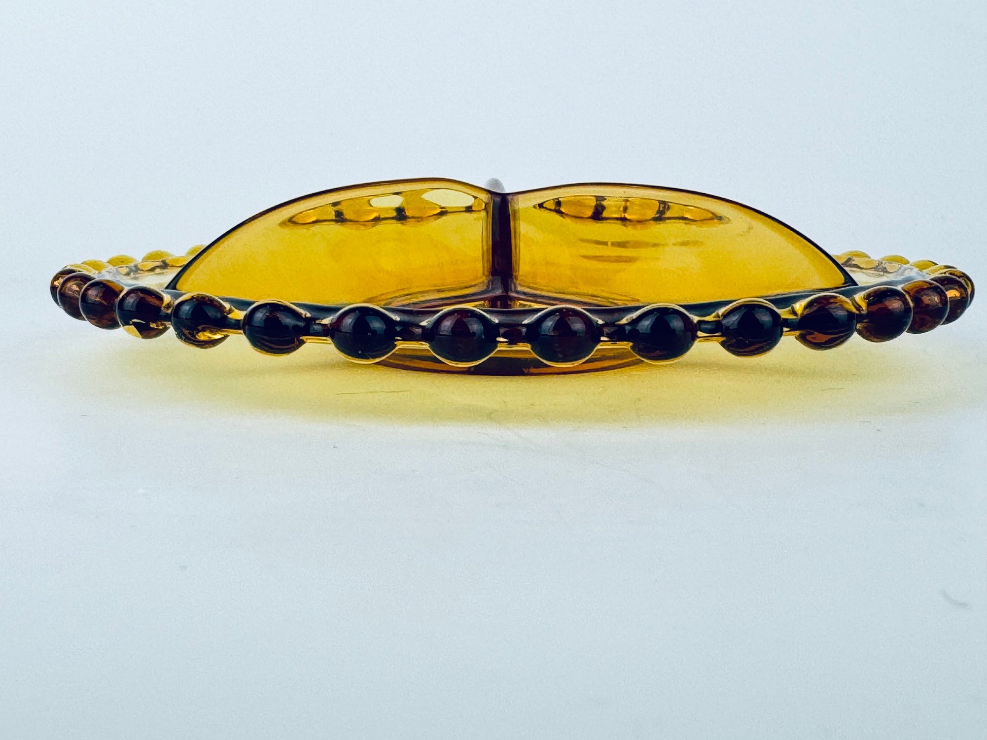 Product image for 'vintage amber candlewick boopie rimmbed glass divided nut dish plate 6' (view 139468)