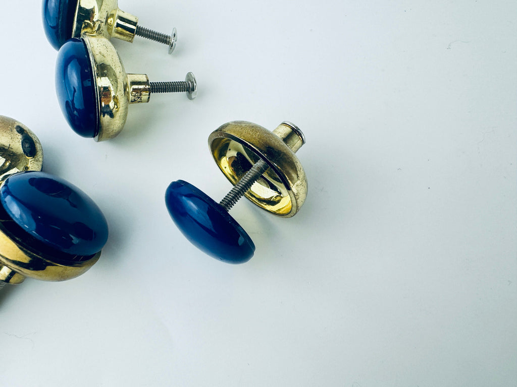Product image for 'vintage 1980s blue plastic brass circular knob drawer pull hardware attractive aged brass patina' (view 5a292f)
