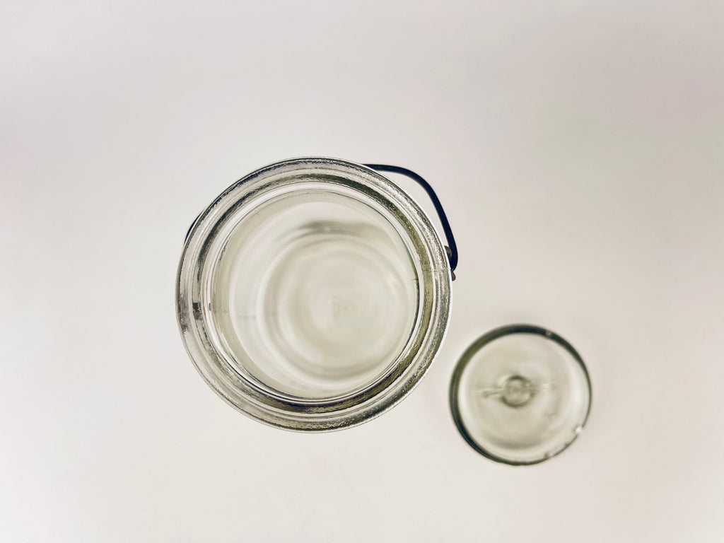 Product image for 'antique safety seal wide mouth glass jar 2 pint capacity metal hinge clasp aka lightning jar made in canada farmhouse decor' (view b09ef5)