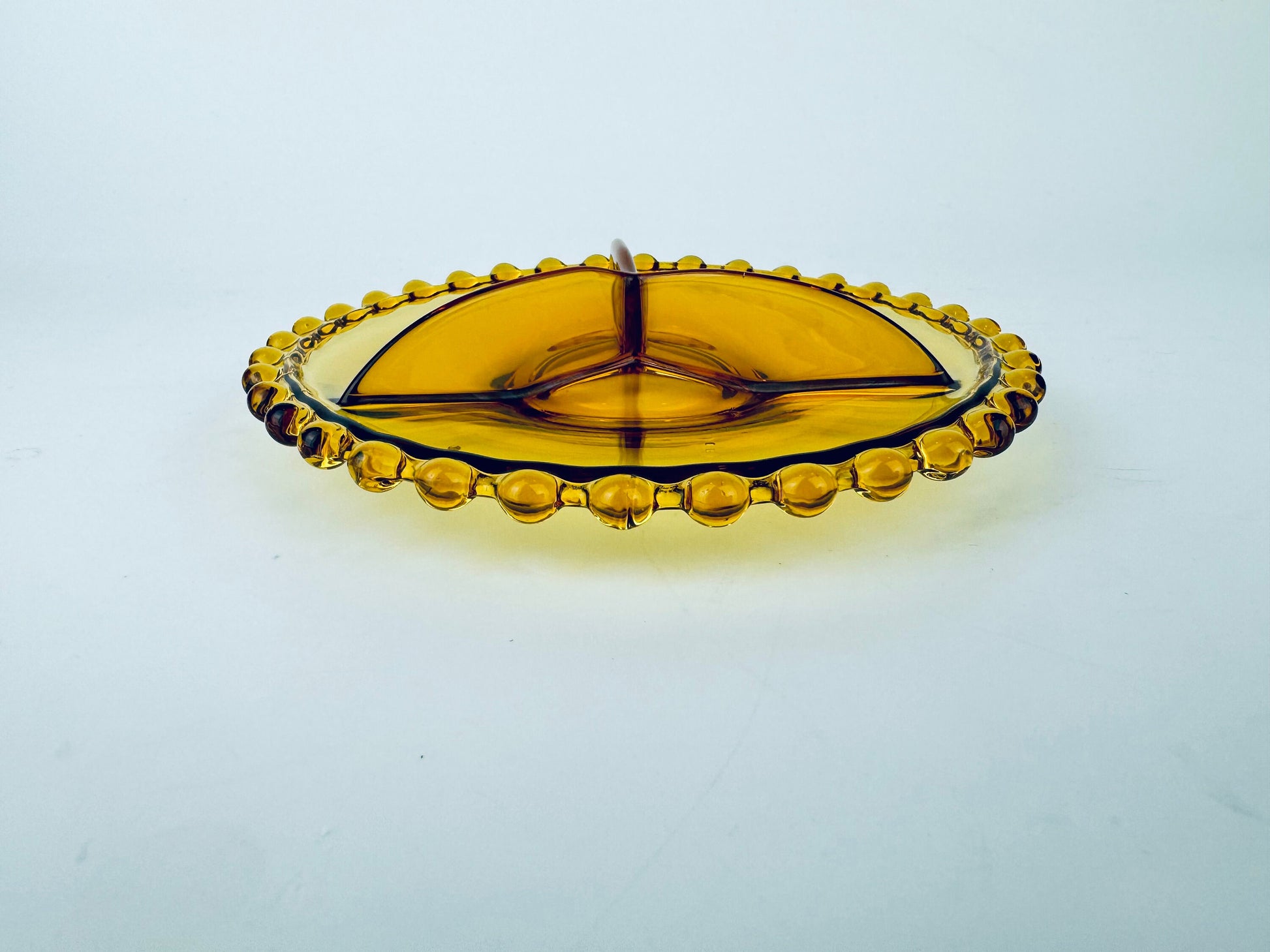 Product image for 'vintage amber candlewick boopie rimmbed glass divided nut dish plate 6' (view bc111c)