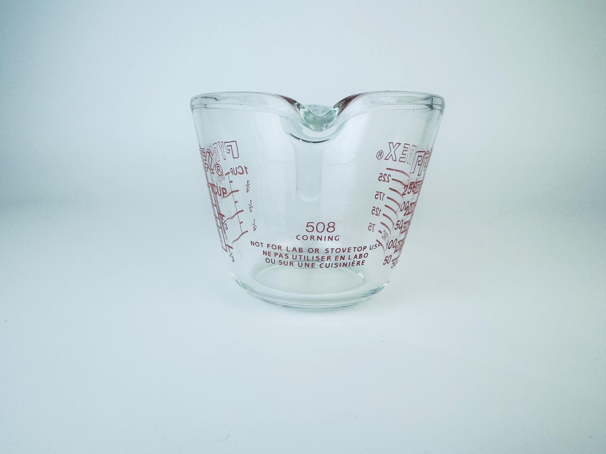 Product image for 'vintage pyrex 508 glass measuring cup 1 cup 250 ml metric imperial system made in usa' (view e43947)