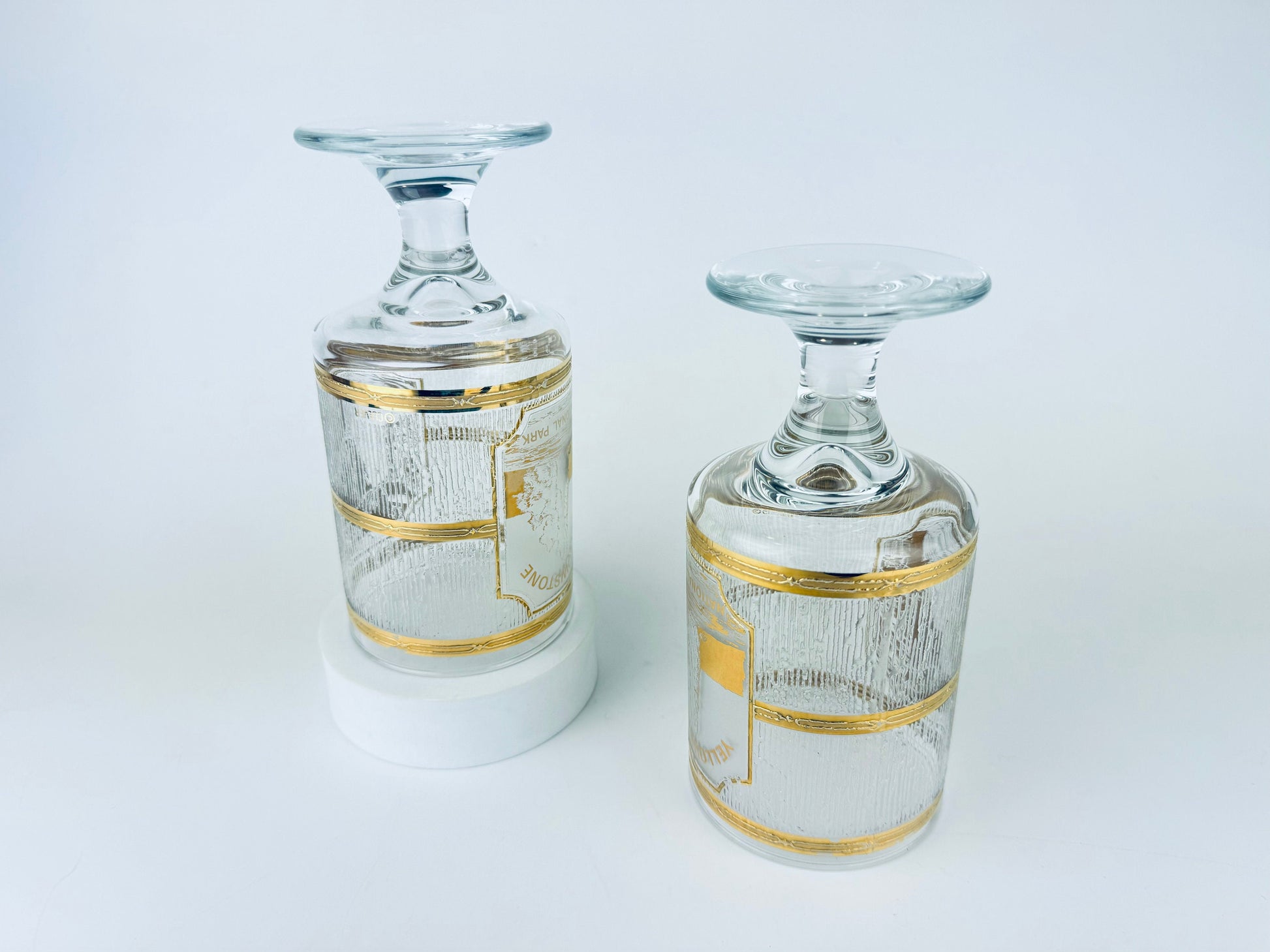 Product image for 'vintage culver tyrol 22 kt gold yellowstone national park souvenir pedestal glasses set of two 2' (view b514c0)