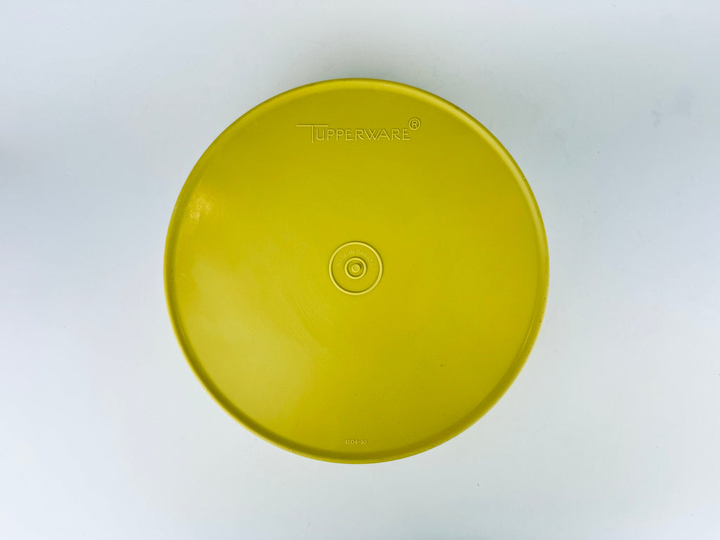 Product image for 'vintage yellow starburst design plastic tupperware stackable nesting countertop container 1204 1205 made in canada' (view 78ae01)