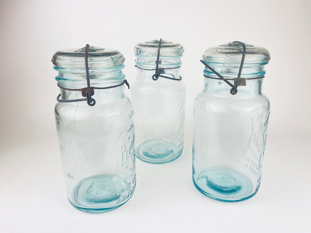 Product image for 'antique safety seal wide mouth aqua blue glass jar 2 pint capacity lightning metal hinge clasp made in canada sold separately' (view 6f566b)