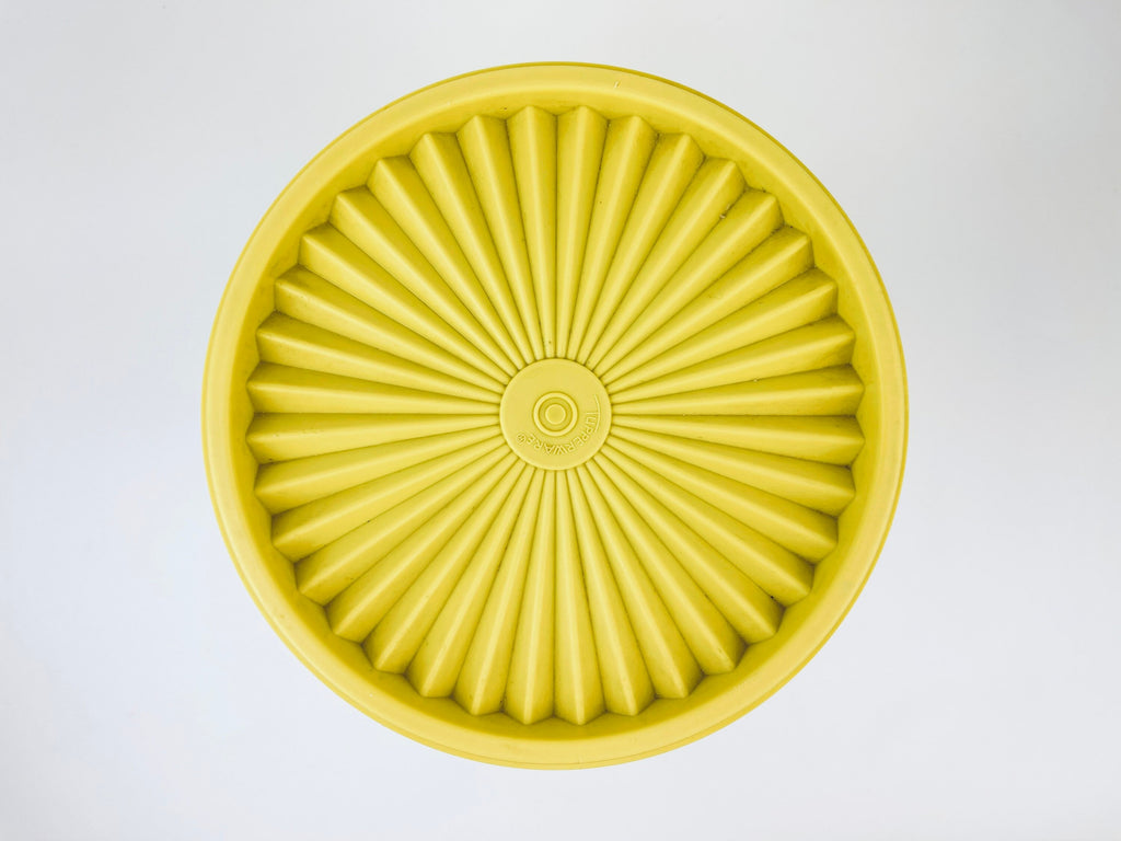 Product image for 'vintage yellow plastic tupperware countertop containers servalier lid starburst pattern made in canada sets sold separately' (view 7e249d)