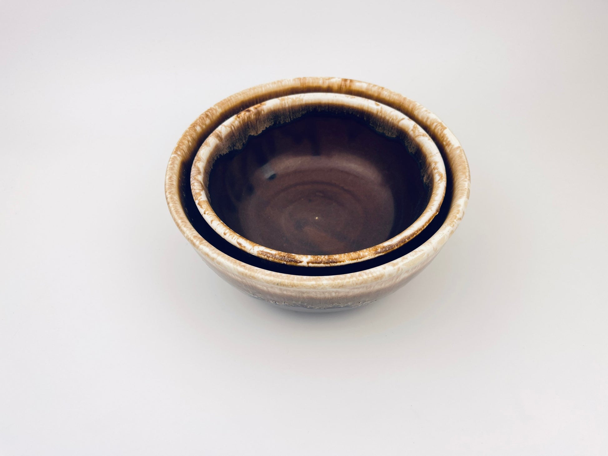 Product image for 'vintage ceramic brown drip glazed usa nesting bowls set of two 2 california pottery' (view 6e69c3)