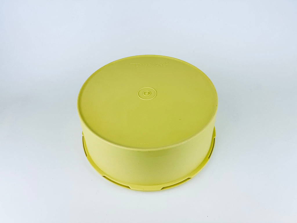 Product image for 'vintage yellow starburst design plastic tupperware stackable nesting countertop container 1204 1205 made in canada' (view b50c6a)