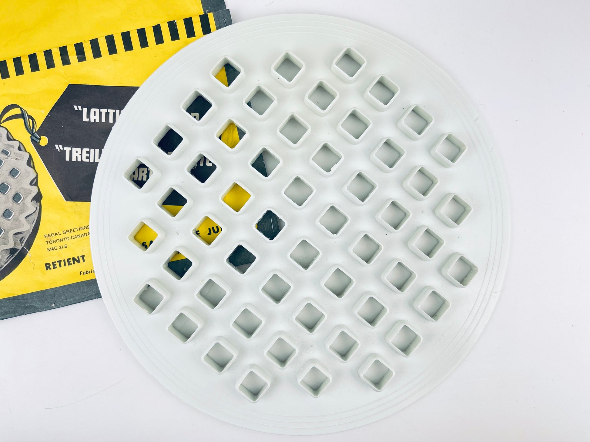Product image for 'vintage plastic lattice pie top cutter saves the juice made in hong kong' (view 42453a)