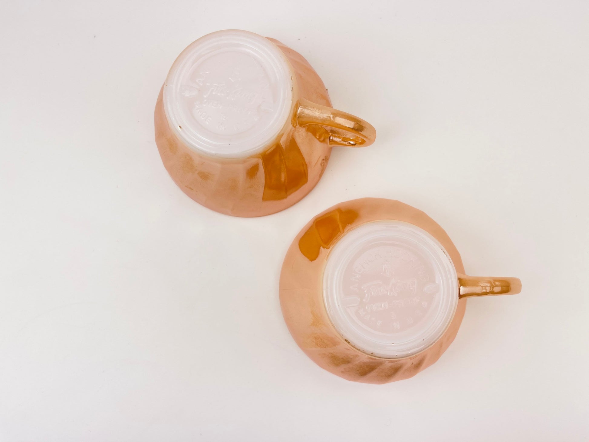 Product image for 'vintage peach lustreware swirl tea cups set of two 2 anchor hocking fire king made in usa' (view eda058)
