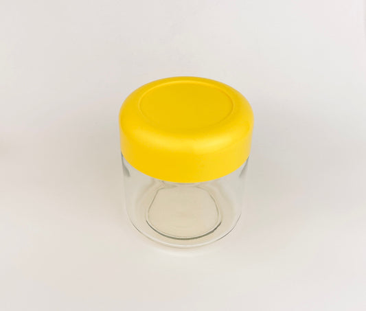Product image for 'vintage heller designs by massimo vignelli yellow plastic top countertop canister' (view a46765)