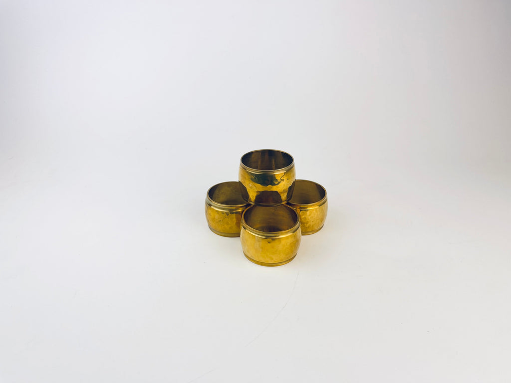 Product image for 'vintage hammered brass barrel shaped napkin ring holders set of four 4 attractive aged metal patina' (view b18db6)