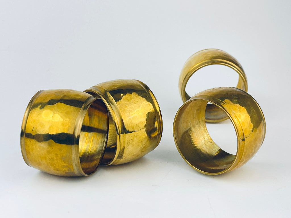 Product image for 'vintage hammered brass barrel shaped napkin ring holders set of four 4 attractive aged metal patina' (view ba6523)
