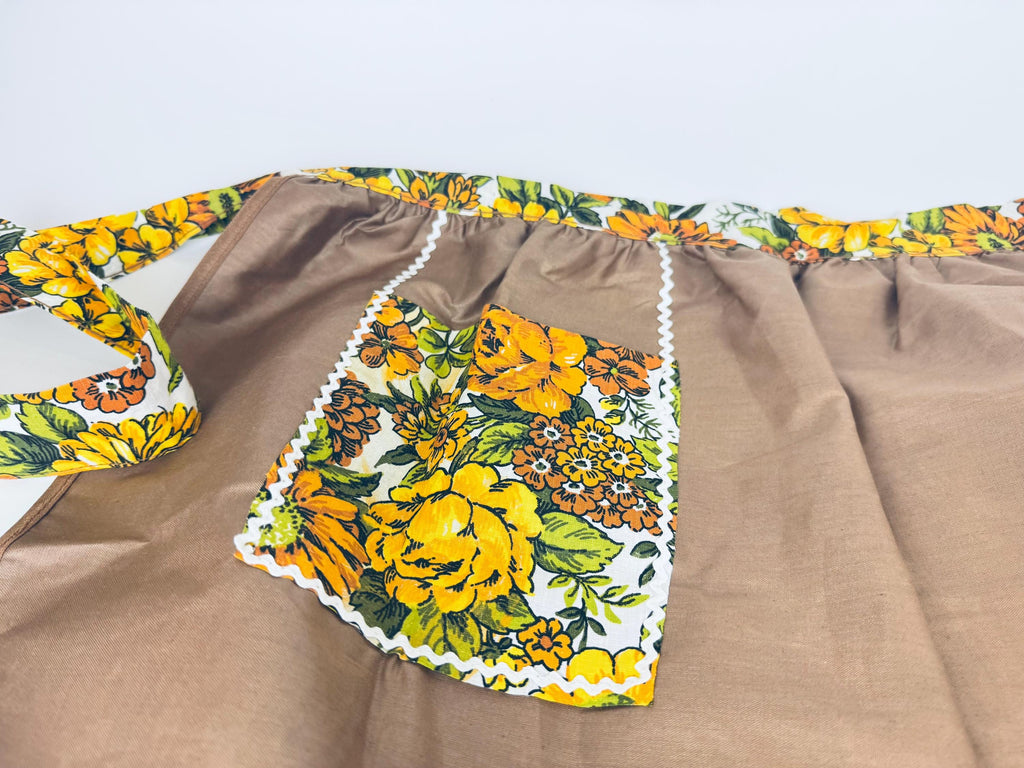 Product image for 'vintage 1960s reversible brown gold floral waist apron with pocket mid century charm' (view ba7008)