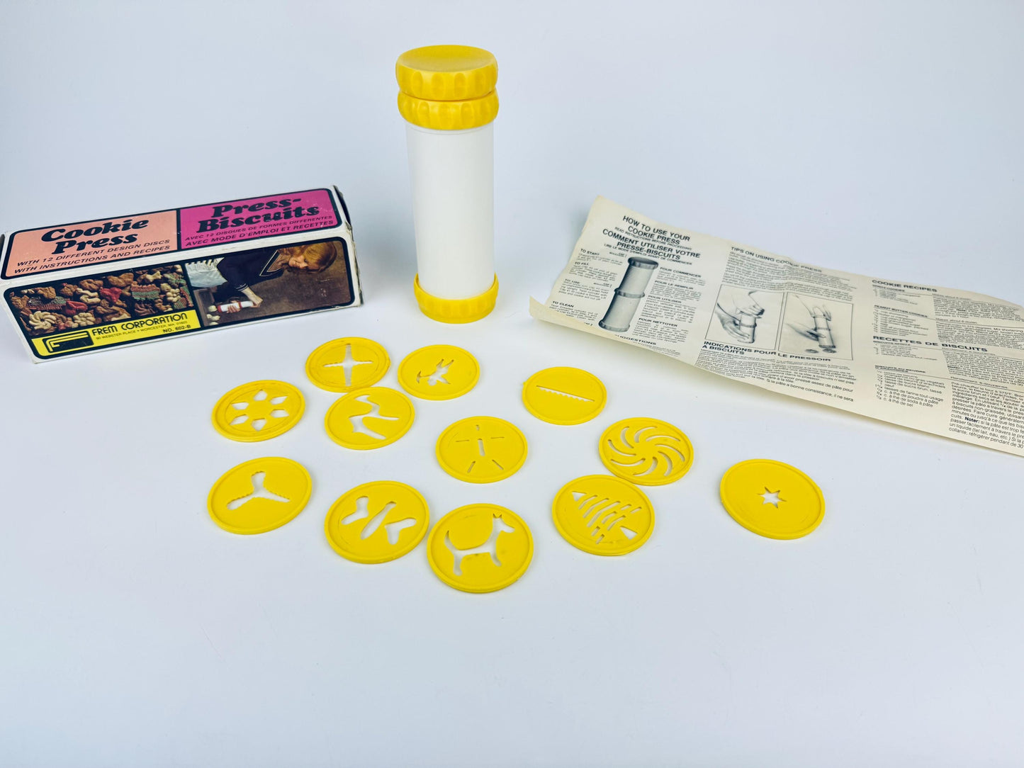 Product image for 'vintage plastic cookie press 12 design discs' (view 8dc475)