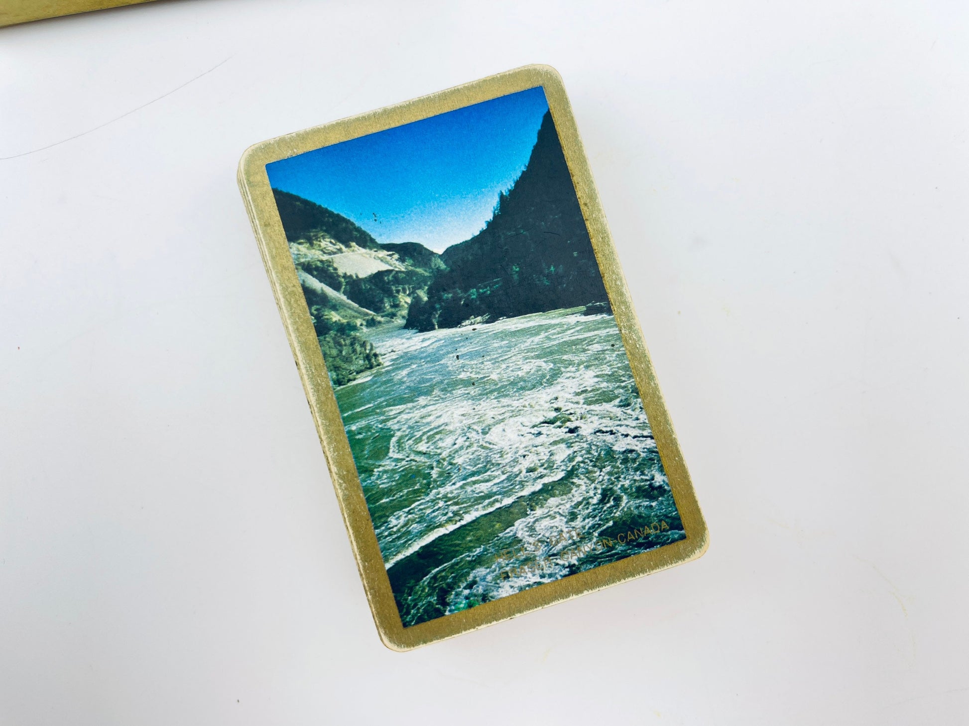 Product image for 'vintage claridge plastic coated playing cards hells gate fraser canyon british columbia image made in canada' (view 858cb3)