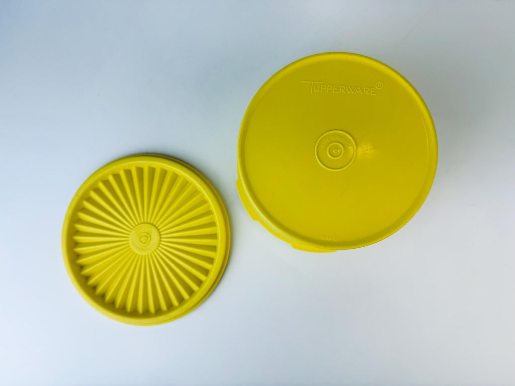 Product image for 'vintage yellow plastic tupperware servalier countertop container instant touch lid scroll pattern made in canada' (view 41b7ae)