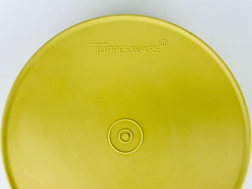 Product image for 'vintage yellow starburst design plastic tupperware stackable nesting countertop container 1204 1205 made in canada' (view dec4fd)