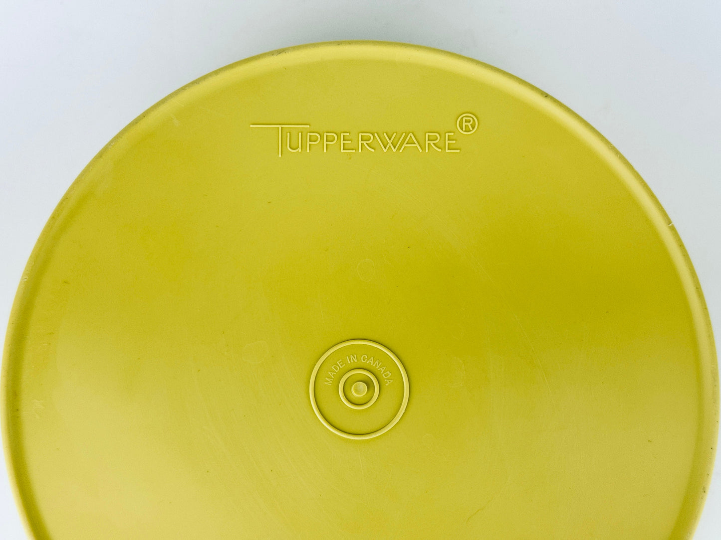 Product image for 'vintage yellow starburst design plastic tupperware stackable nesting countertop container 1204 1205 made in canada' (view dec4fd)