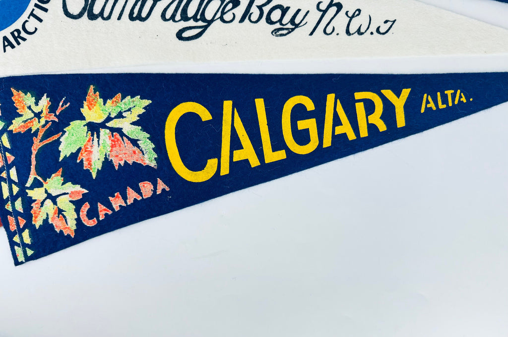 Product image for 'vintage canadian souvenir large tapered pennant wall hangings sold separately calgary alberta mile 1016 alaska highway cambridge bay' (view 9e8754)