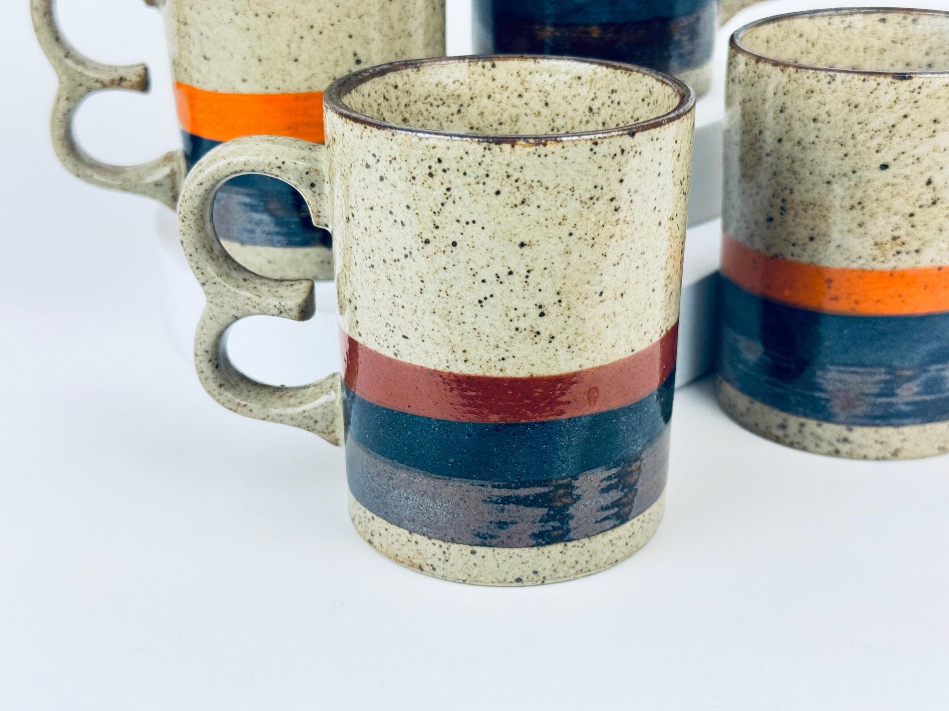 Product image for 'vintage 1970s stoneware mugs speckled glaze with bold stripes double loop handles set of 4 retro coffee cups' (view 1cd0a1)