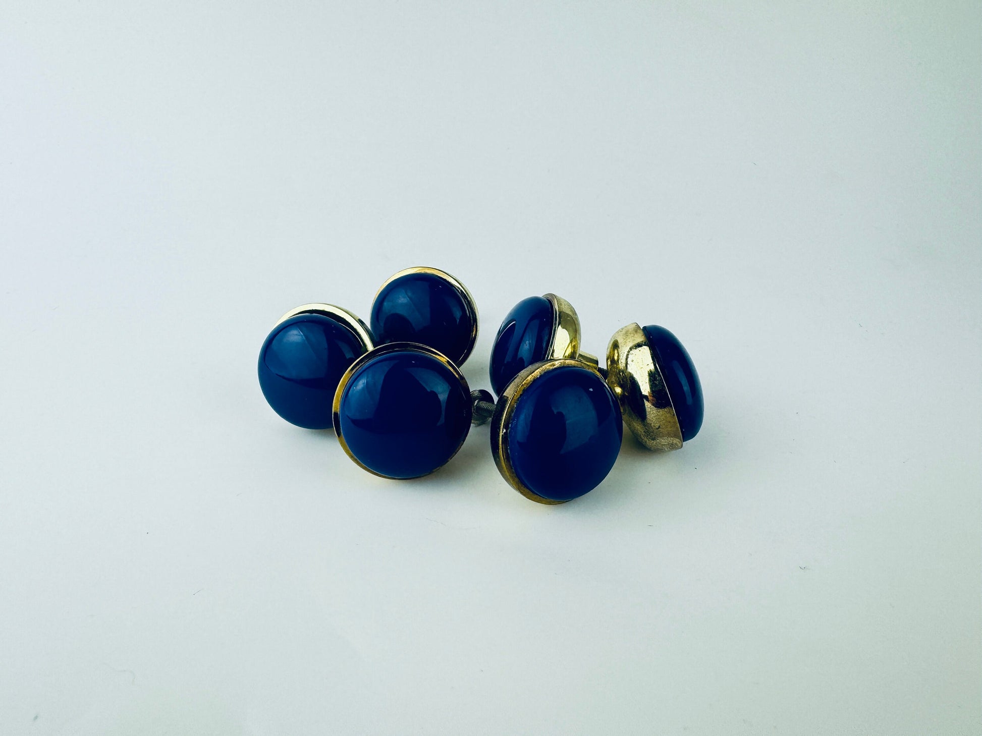 Product image for 'vintage 1980s blue plastic brass circular knob drawer pull hardware attractive aged brass patina' (view 91acbf)