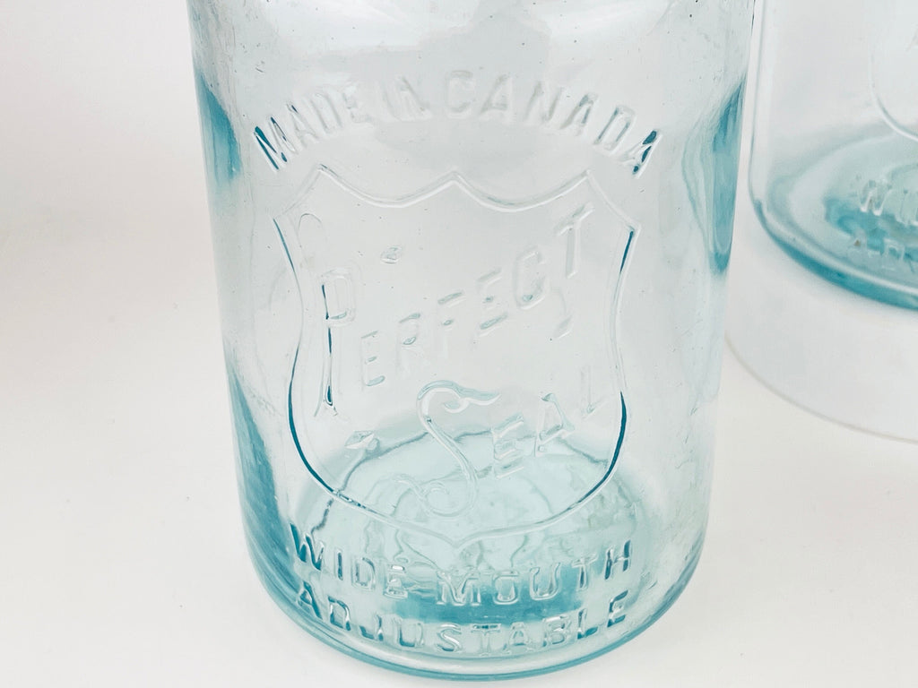 Product image for 'antique safety seal wide mouth aqua blue glass jar 2 pint capacity lightning metal hinge clasp made in canada sold separately' (view 71fc88)