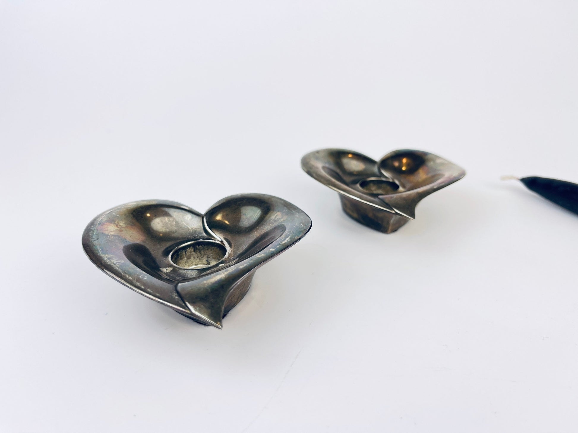 Product image for 'vintage silverplated metal heart tapered candle holder attractive aged metal patina set of two 2' (view 027ff0)