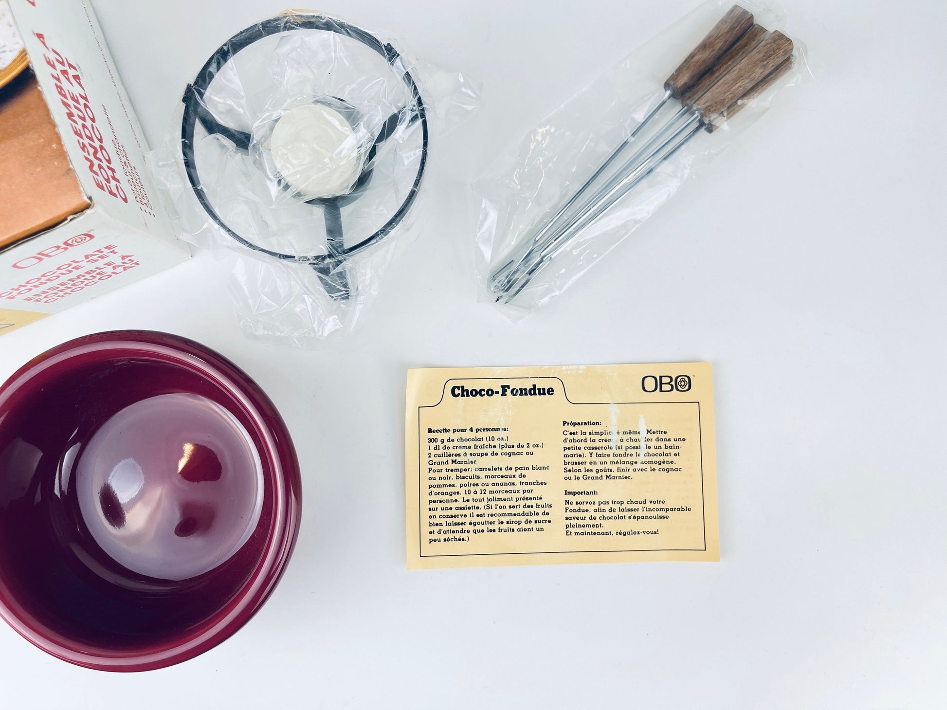 Product image for 'vintage obo cranberry ceramic chocolate fondue set new old stock nos' (view b71a18)