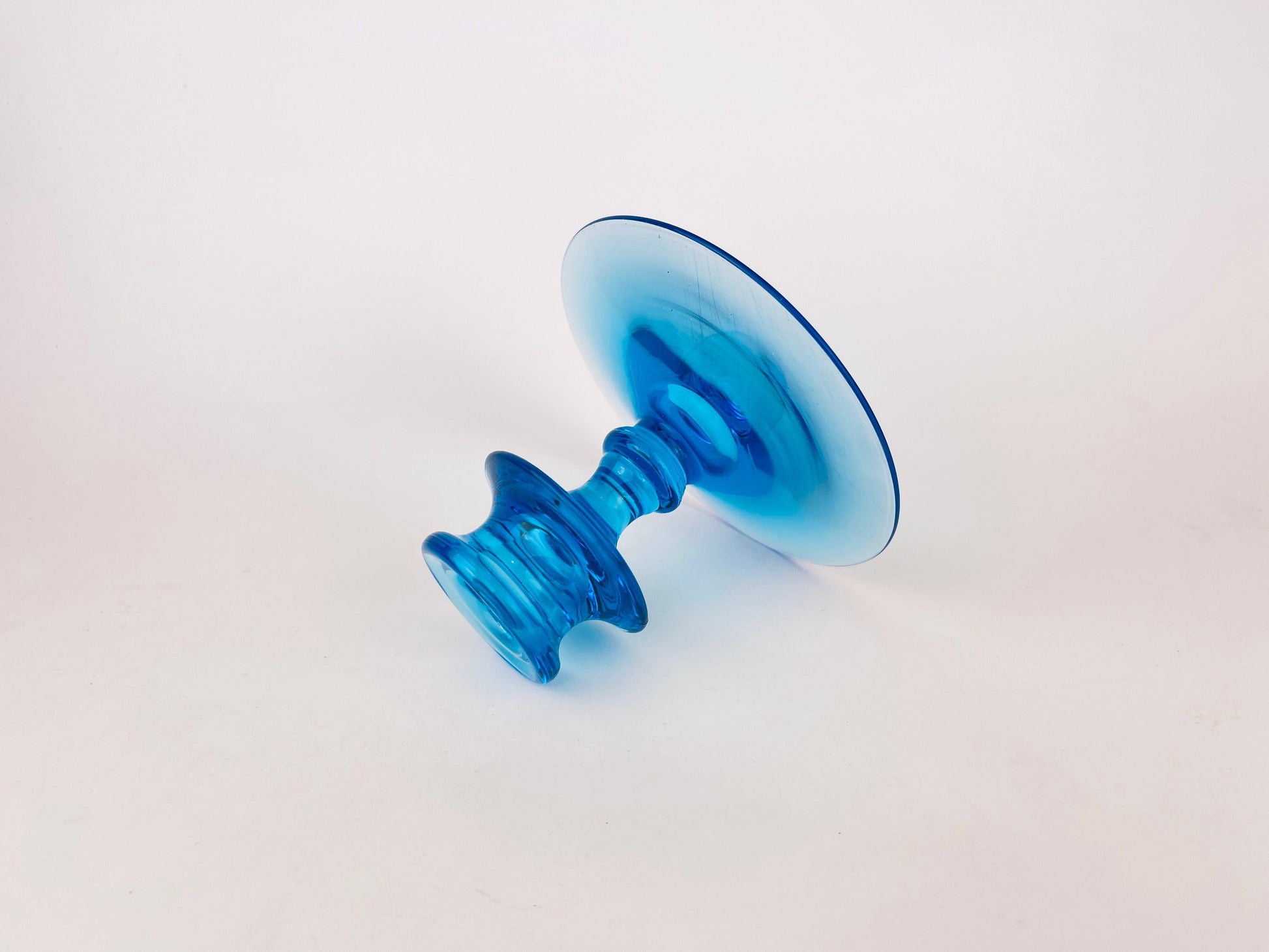 Product image for 'vintage fostoria electric blue glass candlestick holder' (view cb3804)