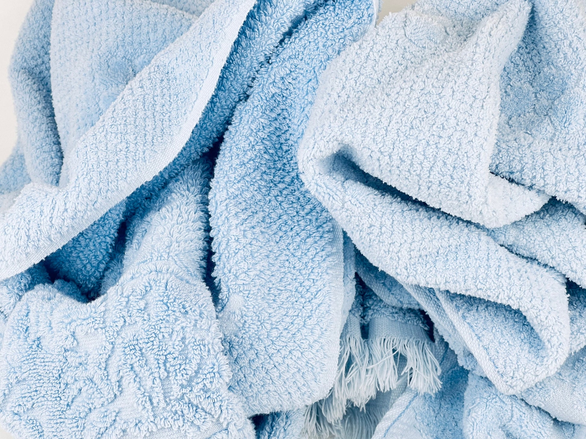 Product image for 'vintage blue textured floral fringe rectangular bath towels cotton polyester blend made in canada sold separately' (view e8e82a)