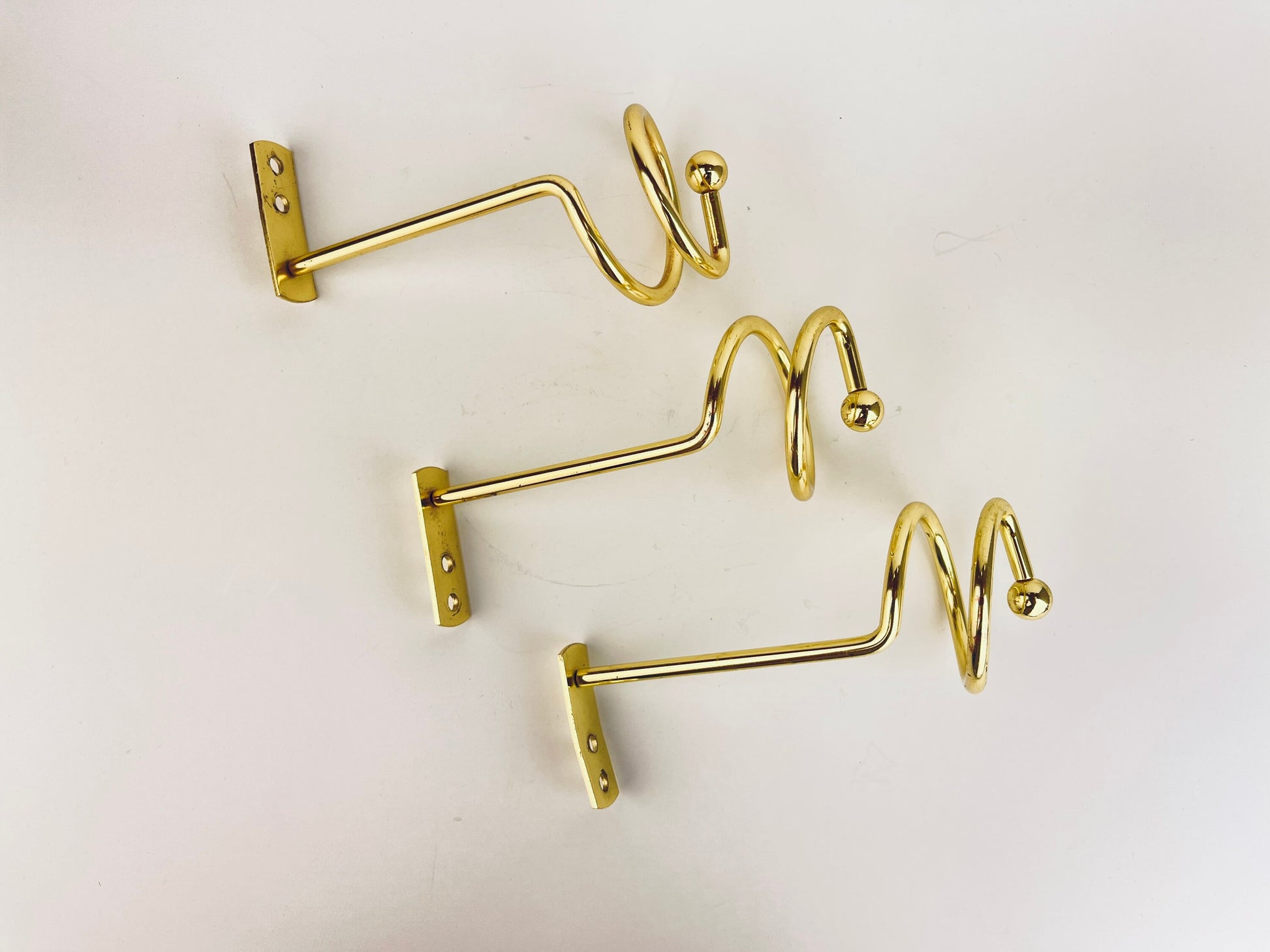 Product image for 'vintage brass swirl spiral brass wall hook aged metal patina set of three 3' (view 10ef2d)