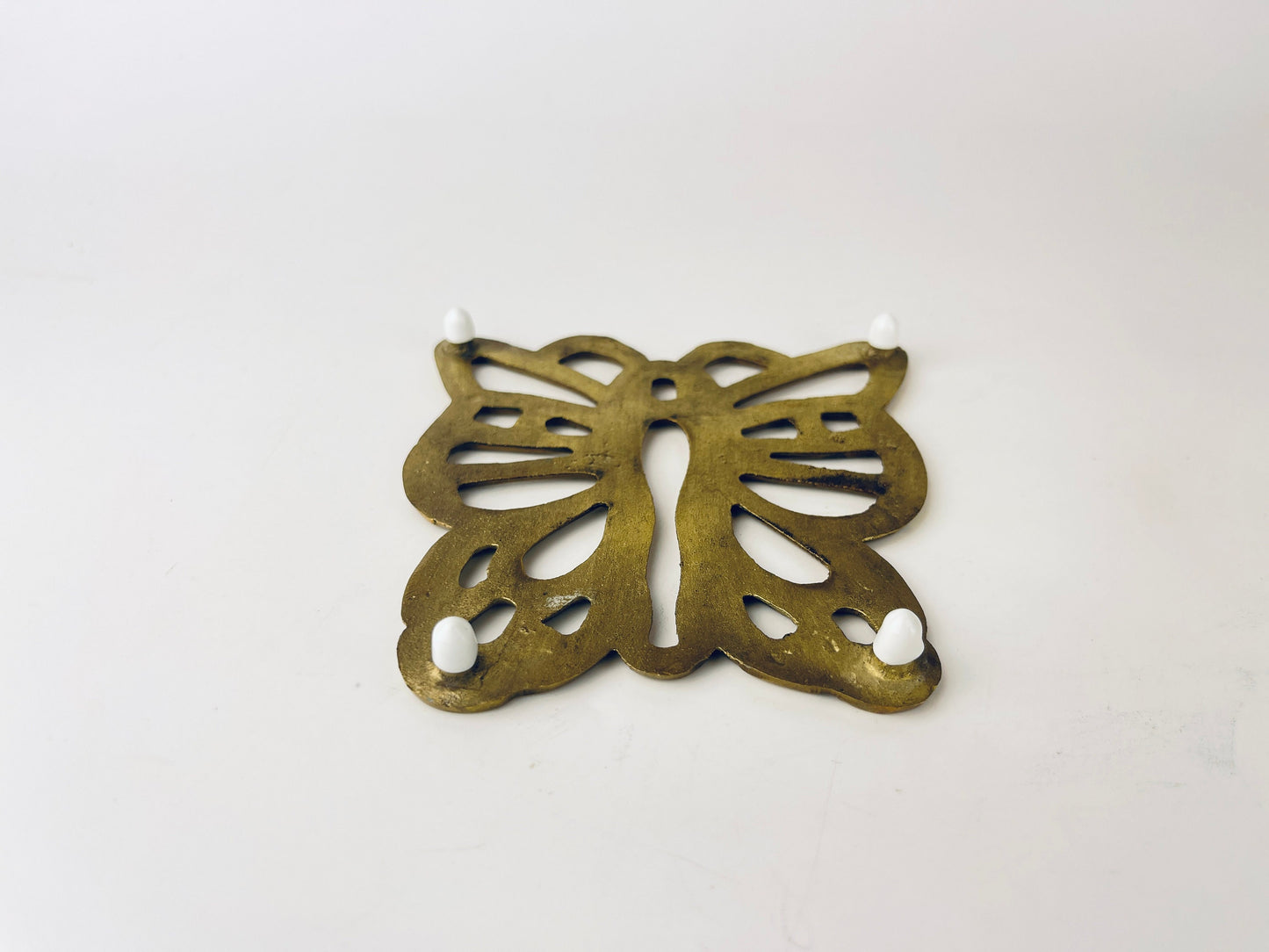 Product image for 'vintage brass butterfly trivet hot pot plate holder table saver attractive aged metal patina' (view b76970)