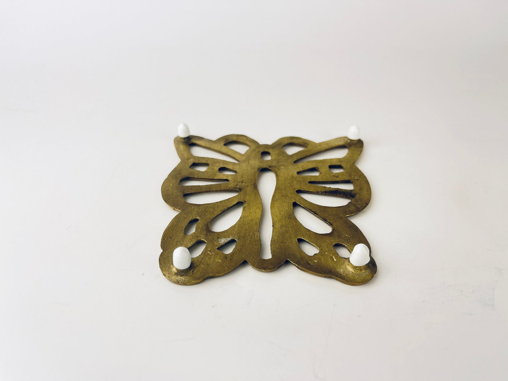 Product image for 'vintage brass butterfly trivet hot pot plate holder table saver attractive aged metal patina' (view b76970)