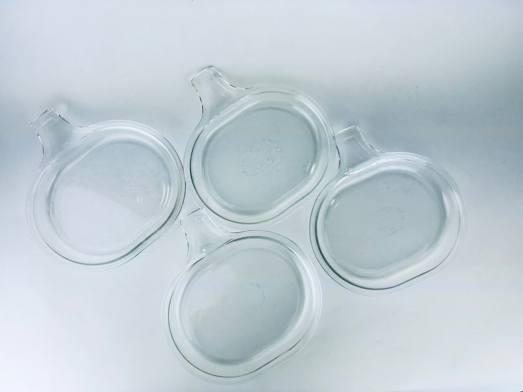 Product image for 'vintage pyrex clear glass grab it microwave oven plates set of two 2 600 b 15 cm x 20 cm made in usa sets sold separately' (view 39dee0)