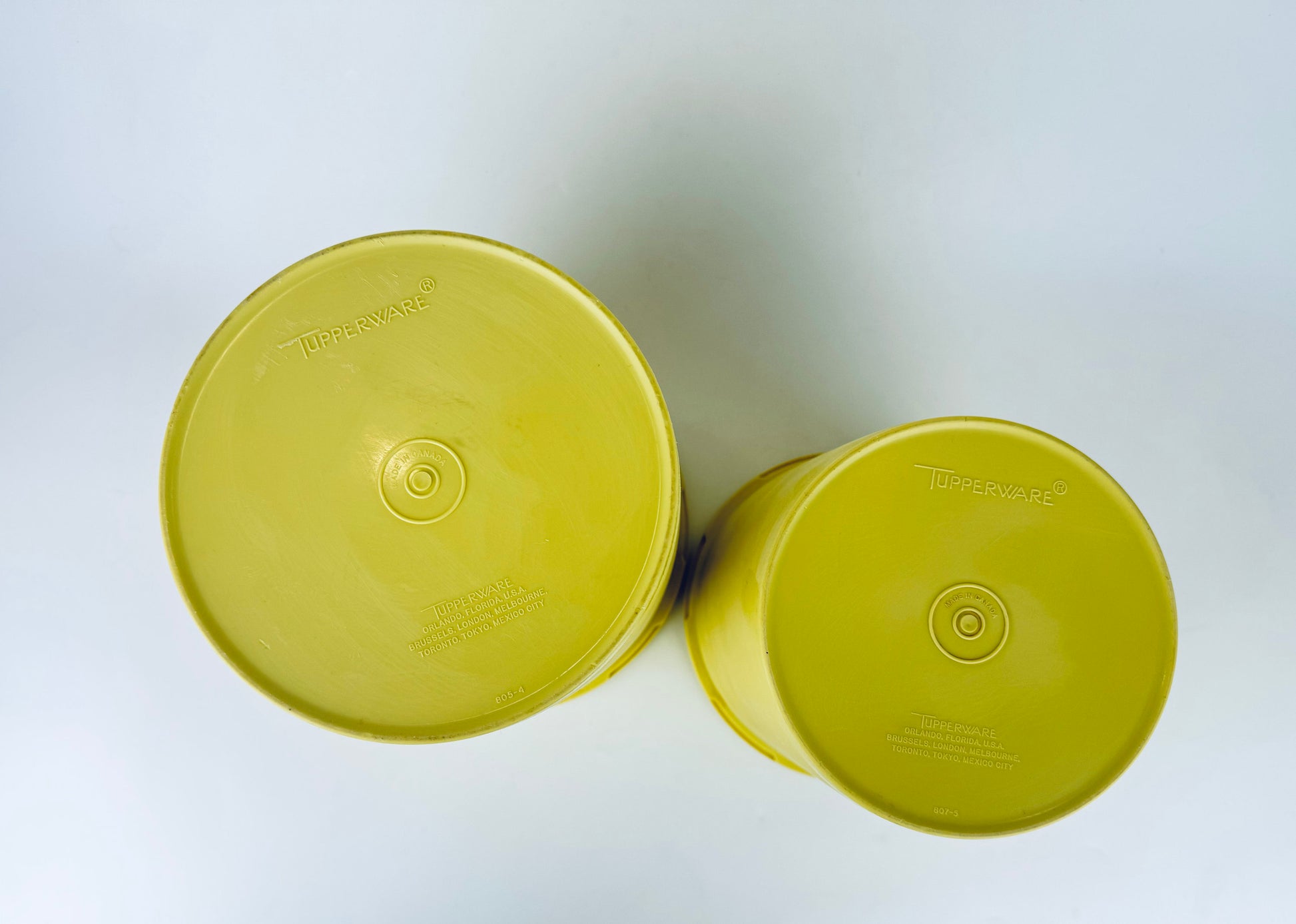 Product image for 'vintage yellow plastic tupperware countertop containers servalier lid starburst pattern made in canada sets sold separately' (view e30ffc)