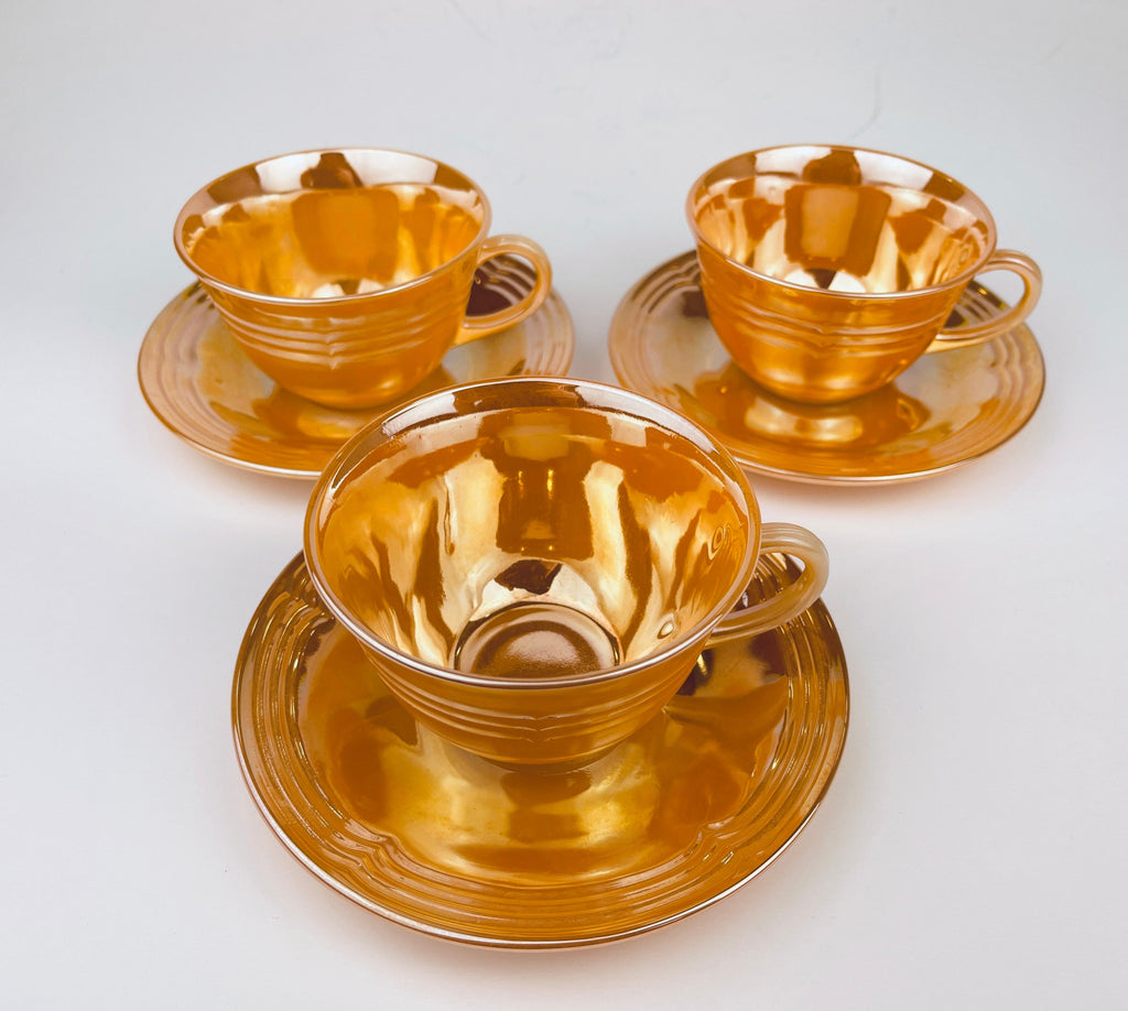 Product image for 'vintage peach lustreware swirl tea cup saucer set replacement anchor hocking fire king made in usa cup saucer set sold separately' (view a0160e)