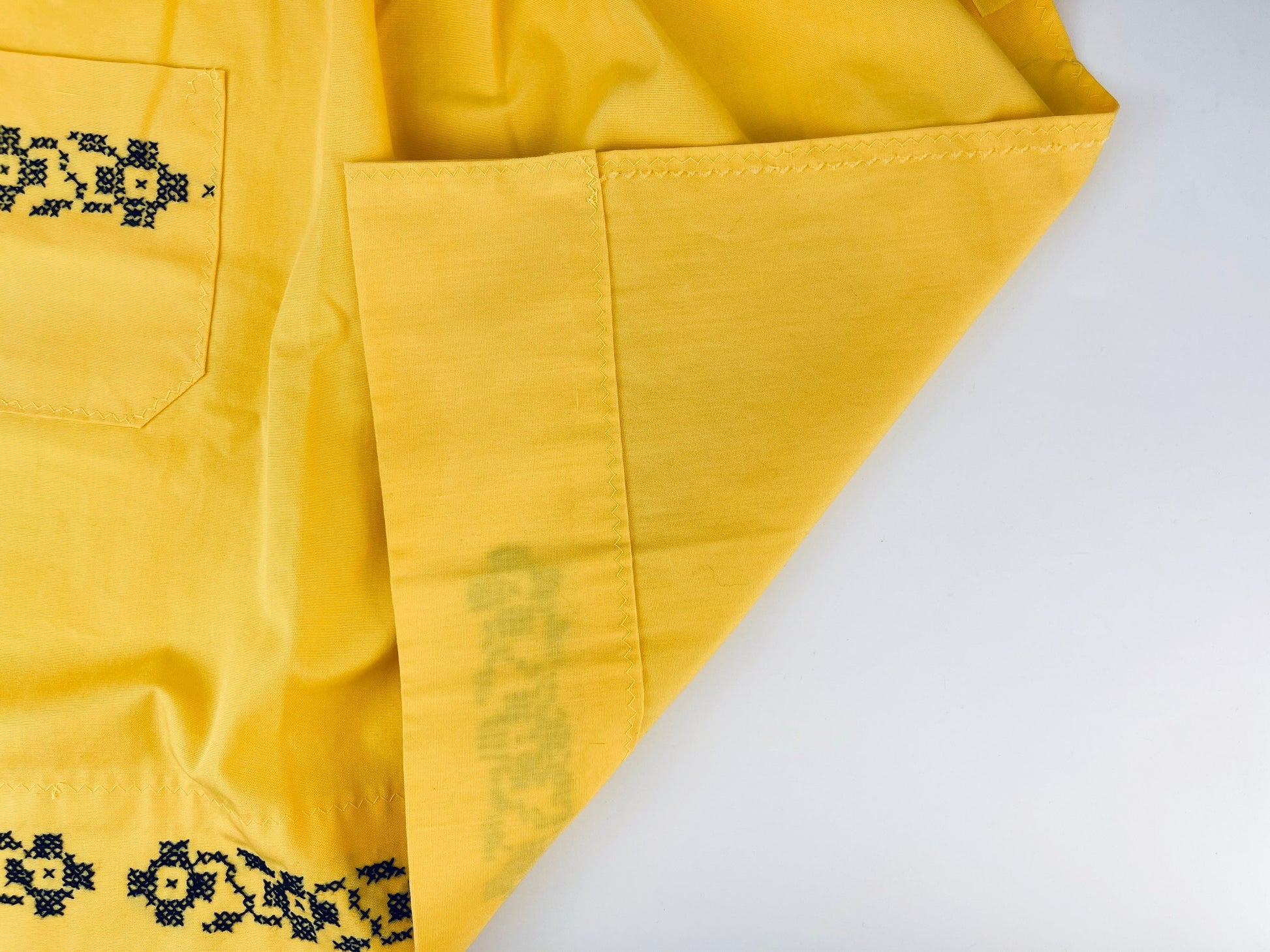 Product image for 'vintage yellow black embroidered waist apron right pocket detail' (view d9189a)
