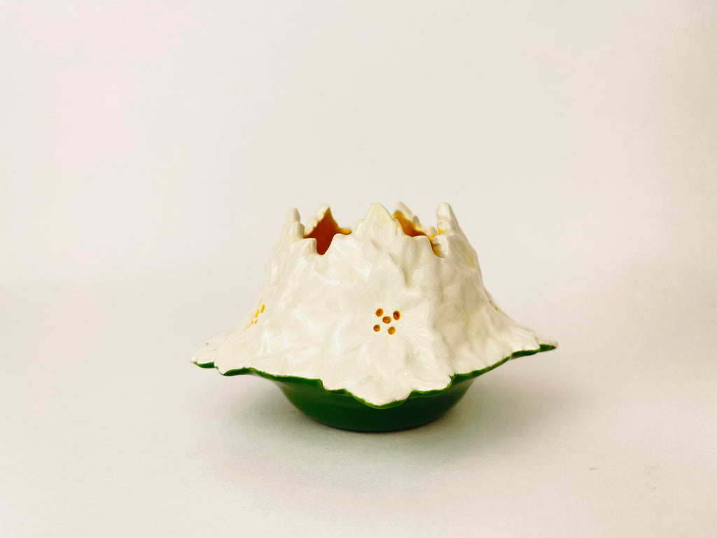 Product image for 'vintage tea light ceramic candle holder white flower green bottom' (view bc3d4a)