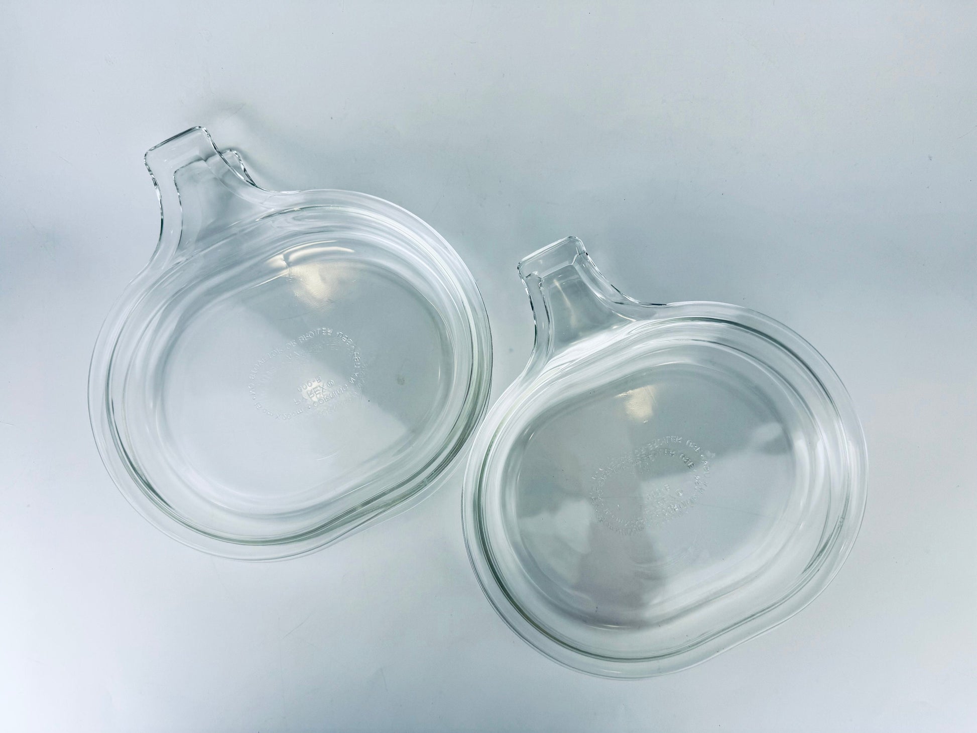 Product image for 'vintage pyrex clear glass grab it microwave oven plates set of two 2 600 b 15 cm x 20 cm made in usa sets sold separately' (view 259ffb)