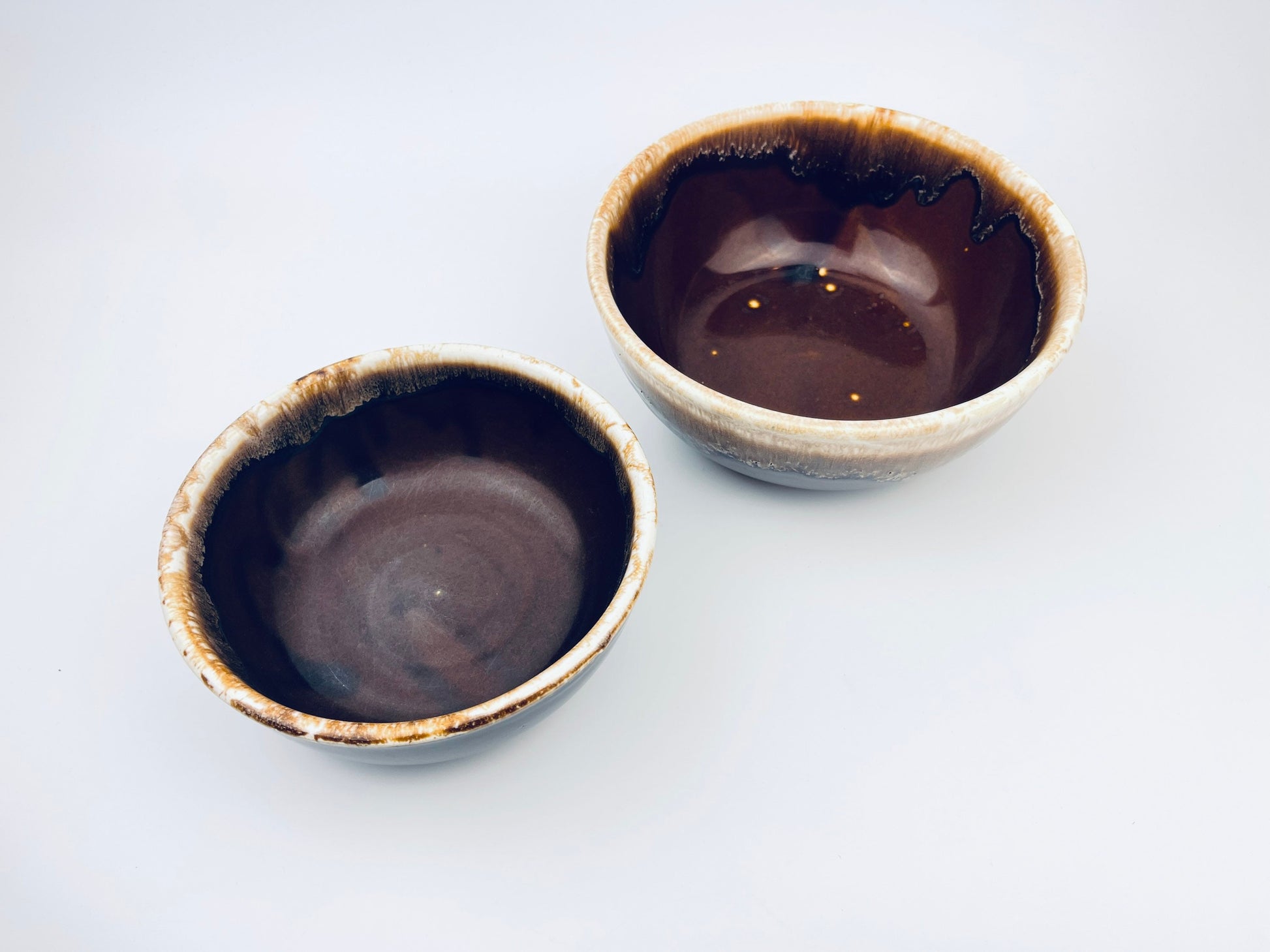 Product image for 'vintage ceramic brown drip glazed usa nesting bowls set of two 2 california pottery' (view a65805)