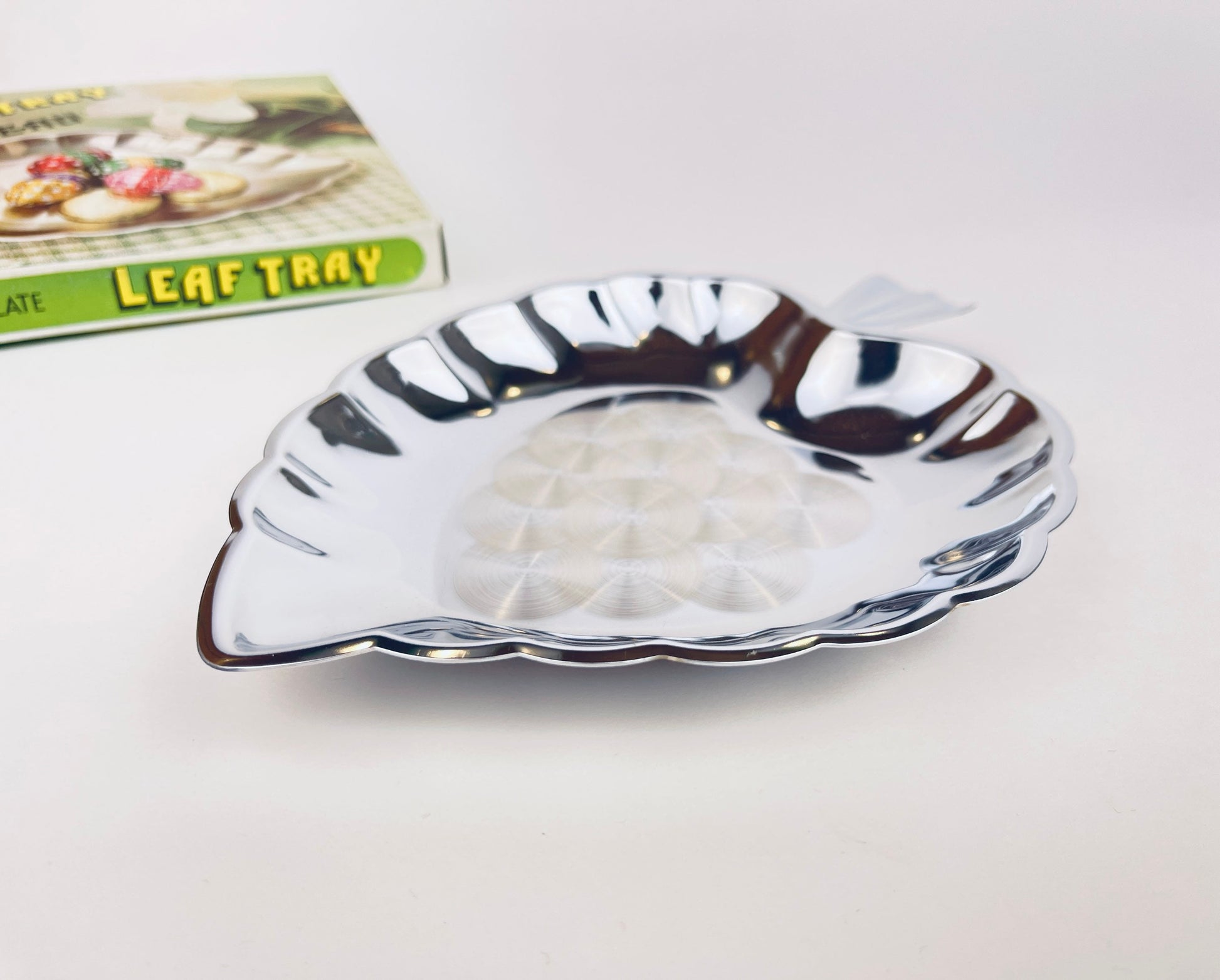 Product image for 'vintage chrome plate leaf tray swirl pattern centre new old stock nos' (view 1848f6)