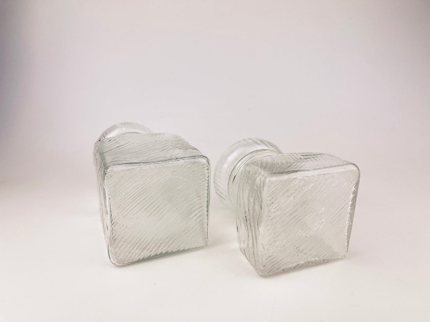 Product image for 'vintage 1970s airtight glass jars with faux wood grain lids set of 2' (view b2eb0a)