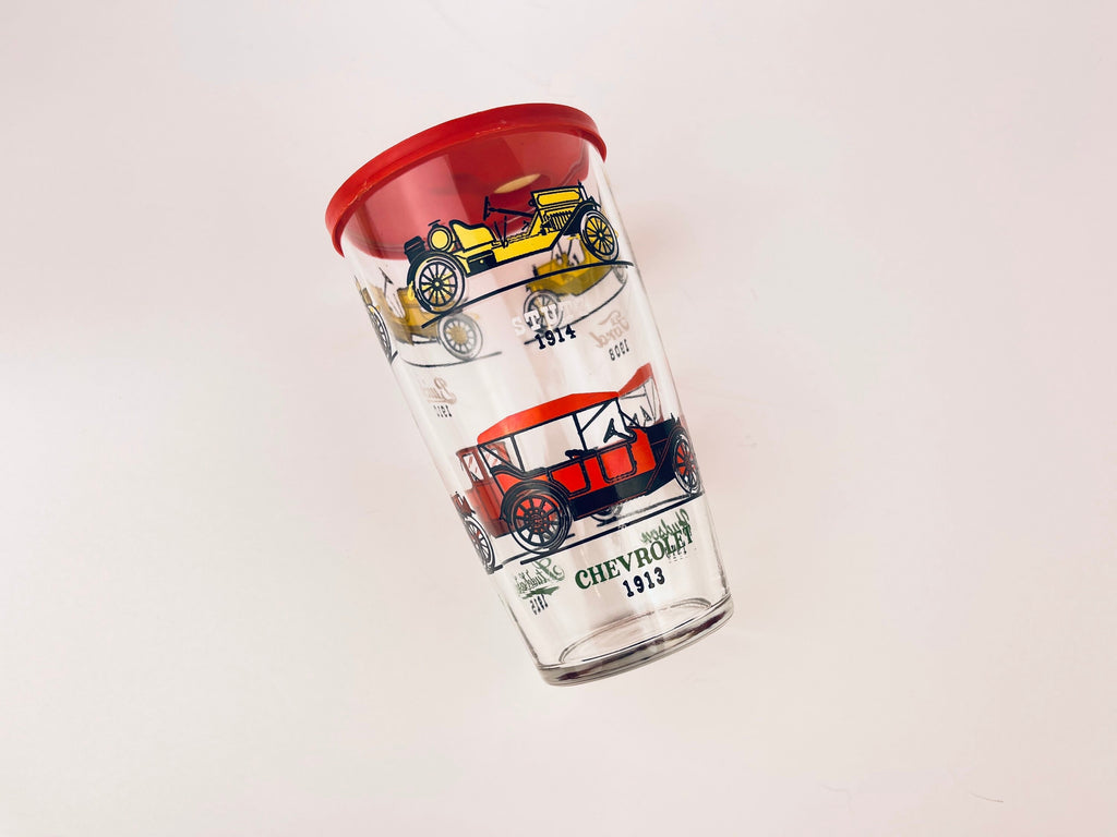 Product image for 'vintage 1970s hazel atlas cocktail shaker with antique car design red plastic lid' (view de1489)