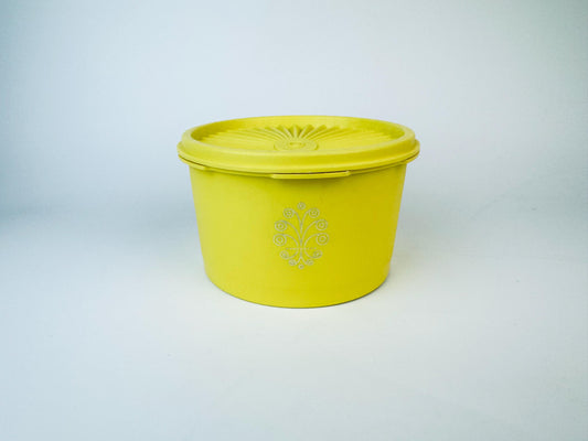 Product image for 'vintage yellow plastic tupperware servalier countertop container instant touch lid scroll pattern made in canada' (view ae7356)