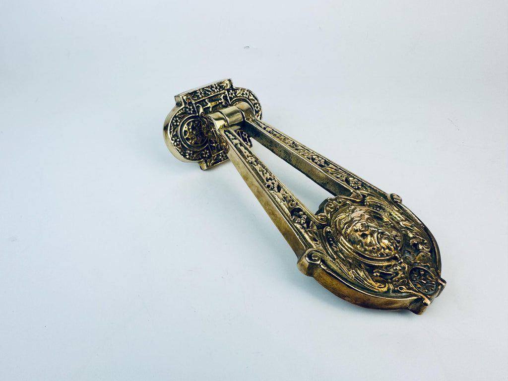 Product image for 'antique english neoclassical brass door knocker classical lyre design with floral and central figure' (view 3a85c3)