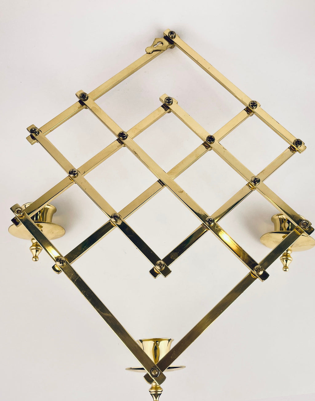 Product image for 'vintage wall mounted brass candlestick holders collapsible attractive aged patina' (view 34f38b)